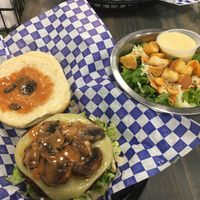 Flatiron Steak Burger (garden patty) w/ a side salad at Meta Burger in Denver