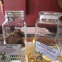 Seedy protein bombs and chocolate coconut biscuits at Himalaya Bakery and Cafe in Daylesford