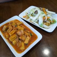 Tofu in tomato sauce and stir fried noodles with veg at Dung Anh in Yen Thanh