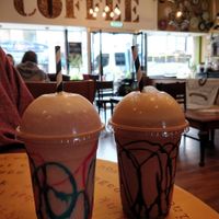 Corten candy with oat milk & chocolate and coconut with coconut milk :) at Black Gold Coffee in Cheltenham