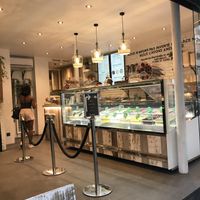 Inside the shop. Green tags are all vegan  at Impronta in Paris