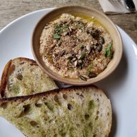 Dukkah-topped hummus with garlic sourdough at The Warren in Carmarthen