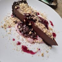 Chocolate and cherry tart with hazelnut topping and yoghurt at The Warren in Carmarthen