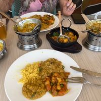 Lemon rice, dahl, mixed veggies, and aubergine dishes - all perfectly spiced and creamy!!  at Crown of India in Altea