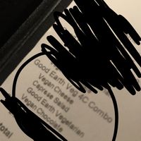 Receipt that says vegan cheese and vegan chocolate at The Melting Pot in White Plains