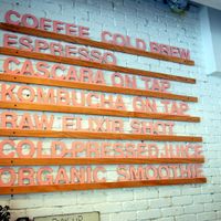 There's a bakery and coffee shop next door. at The Butcher's Daughter in Brooklyn