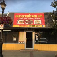 Lots of street parking in front at Butter Chicken Hut in Stony Plain