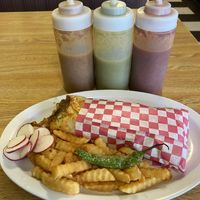 Pastor style burrito. Comes with fries and diced radish    at El Michoacano Ice Cream and Mexican Food in Des Moines