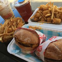 (2) single patty burgers w/ fries & tots (50/50), salted caramel shake, & ice tea at Monty's Good Burger in Riverside