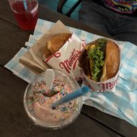 Double burger, chicken sandwich, strawberry shake and cherry bomb!  at Monty's Good Burger in Riverside