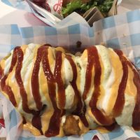 Dogpile- tatertots, 2 patties, grilled onions topped with different sauces  at Monty's Good Burger in Riverside