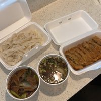 From left to right : vegetarian beef (ginger and green onions)  plain steamed rice noodle, wonton soup , mock duck at Delicious Vegetarian Restaurant in Winnipeg