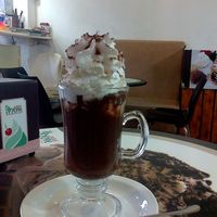 A hot Cioccolata with whipped cream, all Vegan. at Grande Italia in Rehovot
