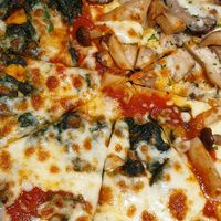 Spanich Olive and Mushroom Pizza at On the Table in Bangkok