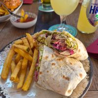 Fries are from my father, there are no fries with a wrap unfortunatelly. at King's Caffe in Malinska
