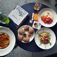 Pumpkin hummus, hummus salad, palenta, wholegrain buns at bistro ZDRAVO in Sarajevo