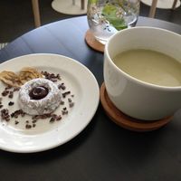 Cake-like donut and matcha latte. at bistro ZDRAVO in Sarajevo