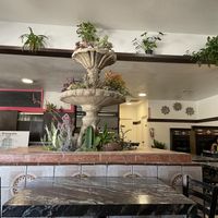 Succulent fountain and plants throughout    at Borreguitas in Pomona