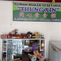 The store's logo at Thung Xin in 