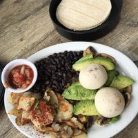 Vegan poached runny eggs!   at Coyote Grill in Laguna Beach