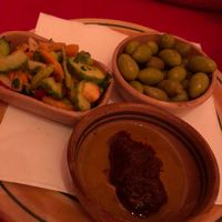 Smoked homemade harrissa, green olives from the island and veggie salad at Radisson Blu Udaipur Palace in Mezraya