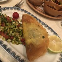  Traditional Tunisian brick pastry filled with vegetables and side salad  at Radisson Blu Udaipur Palace in Mezraya