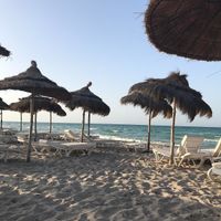 Private beach at the hotel, with waiter service. at Radisson Blu Udaipur Palace in Mezraya