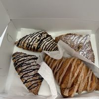 2 chocolate almond croissants, a lavender blueberry turnover and a cinnamon croissant.  All were amazing!   at Happy Little Treats - High St in Columbus