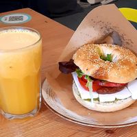 Vegan in Athens and fresh orange juice. Tasty stuff! at Big Bad Bagels - Baznicas in Riga