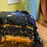 The frosting is black, and the almost non-existent cake is the yellow funfetti  at Haddonfield Donut in Haddonfield