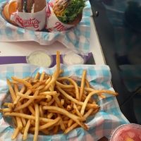 Our spread with a delicious strawberry lemonade to wash it down  at Monty's Good Burger - Koreatown in Los Angeles