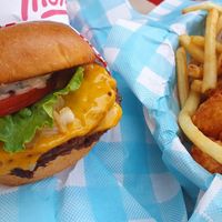 Double cheeseburger with fries + tots at Monty's Good Burger - Koreatown in Los Angeles
