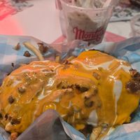 The dog pile with fries and oreo milkshake at Monty's Good Burger - Koreatown in Los Angeles