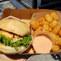 Single Buger, tater tots with house sauce and chocolate vega n shake at Monty's Good Burger - Koreatown in Los Angeles