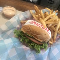 Single Impossible patty cheeseburger with fries and house sauce for dipping at Monty's Good Burger - Koreatown in Los Angeles