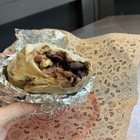 Burrito a few bites in. I built a small one    at Chipotle - Boylston St in Boston