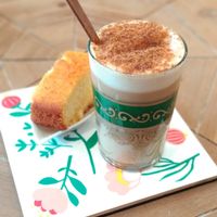 Their "cafe-olé" with a small piece of cake at Okaeri in Gijon
