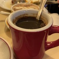 Nice mug filled with an americano coffee  at The Breakfast Club in London