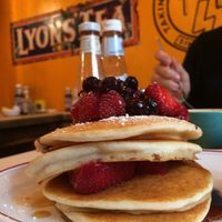 pancake and berries at The Breakfast Club in London