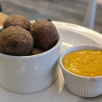 Falafel balls with vegan mango sauce at Cafe Aina in Stirling