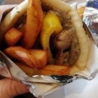 Vegan souvlaki with homade pitta bread and olive houmous   at Cafe Aina in Stirling