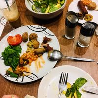 sharing vegan breakfast and awesome salad  at Cafe Aina in Stirling