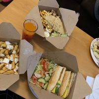 Avocado baguette + vegan Greek fries, 
Halloumi wrap, 
Chicken plate at Cafe Aina in Stirling