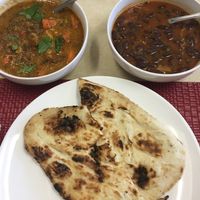 Lentil and veggie soup, curried kidney beans, and naan — all vegan! at Mera Khana in Berlin