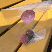 Raspberry praline & Blood orange  at Petris Chocolate Room in Porvoo