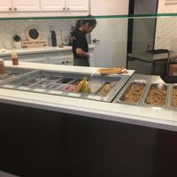 Many toppings! Granola, fruits, seeds, nuts, and drizzles  at Berry Brand in Tustin
