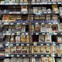 Lots of vegan options (cheeses on the top)  at Biocoop La Source in Lavau