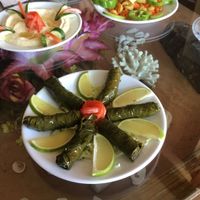 Stuffed grape leaves with lime and tomato (appetizer) at Syrian Palace in Aqaba