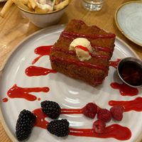 Almond butter French toast with a side of Dutch fries.   at Fresh Kitchen & Juice Bar in Toronto