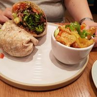 Black bean burrito and dragon fries at Fresh Kitchen & Juice Bar in Toronto